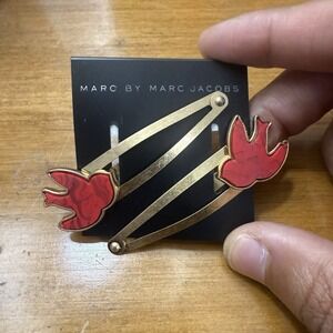Marc by Marc Jacobs gold and red hair clips